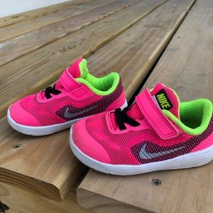 Nike toddler sneakers pink and lime green size 6C. 6
